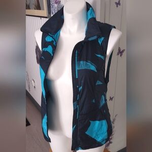 Lululemon Women’s Pack-It Vest Back Spin Stroke Peacock Blue Black Size 10 EUC